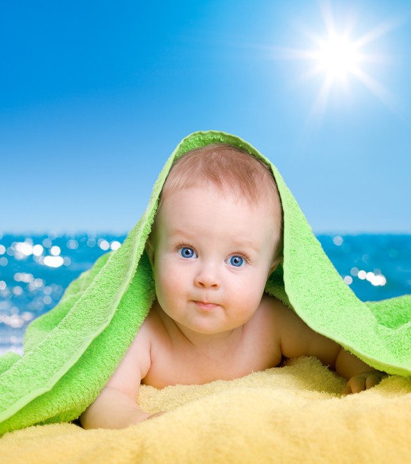 Infant and vacation on the beach