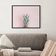 Pineapple on pastel pink wall