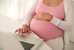 Pregnant woman pregnancy laptop online