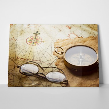 Compass and glasses on antique map 306901955 a