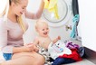 Baby mother washing machine chores clothes