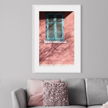Window on pink wall